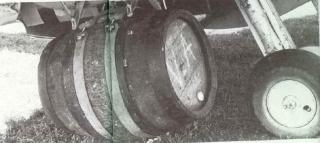 Imagine atasata: Spitfire_transport_a_pair_of_containers_with_a_beverage_in_great_demand_in_Normandy.jpg