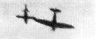 Imagine atasata: Spitfire_Tipping_V_1_Flying_Bomb.jpg