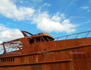 Imagine atasata: depositphotos_1110160-Rusty-Boat-on-blue-sky.jpg